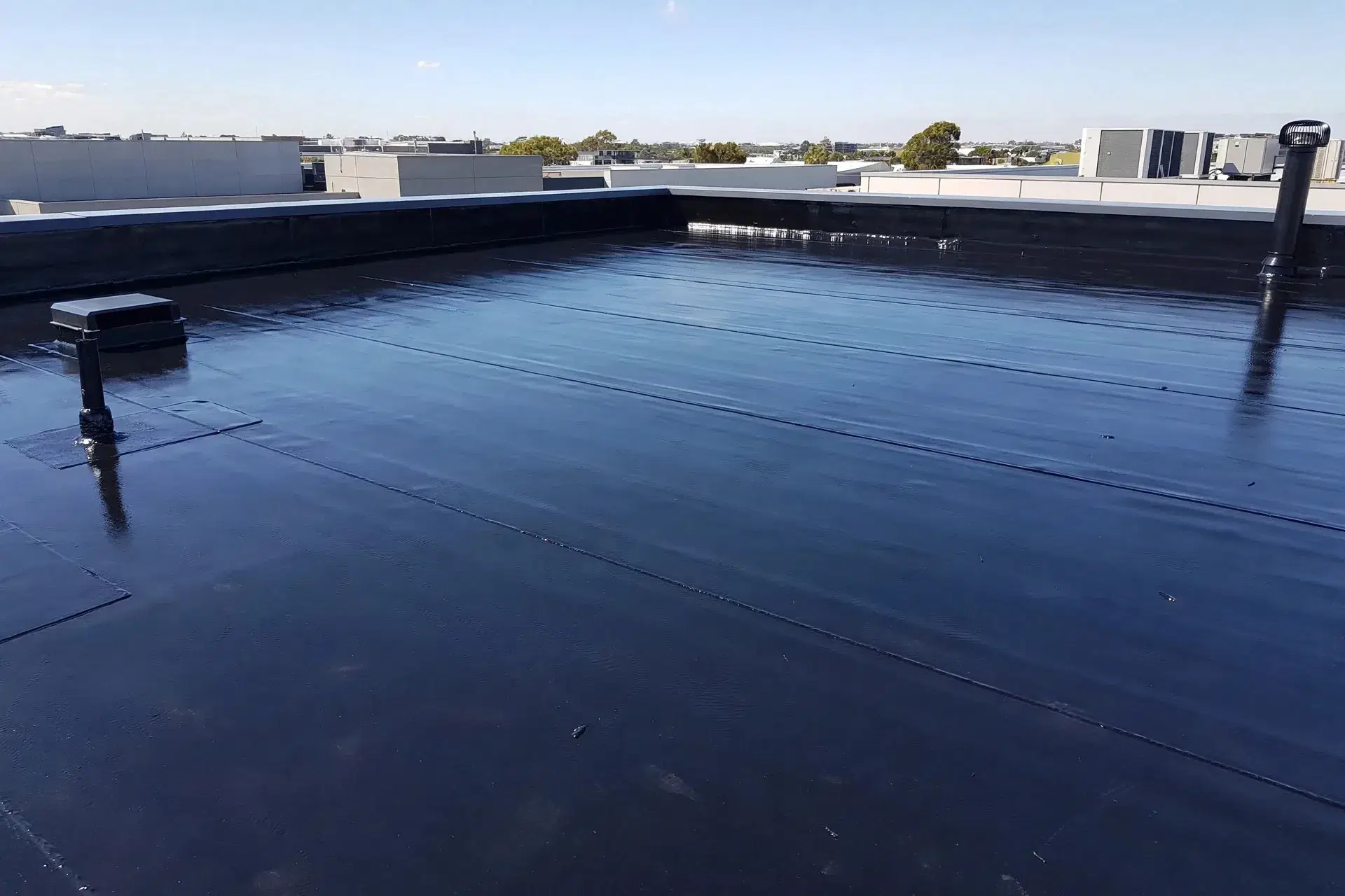 House Painters in Paremata: Local Painting Contractors 7 Butynol coating Paremata - freshly coated membrane roof